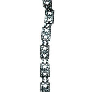 A signed MONET gunmetal link bracelet.